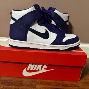Slightly worn Nike Dunks High Tops with original box. Size 7y (fits 7 women)